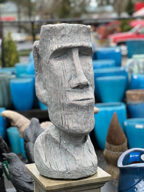 Yard art statue of Easter Island head