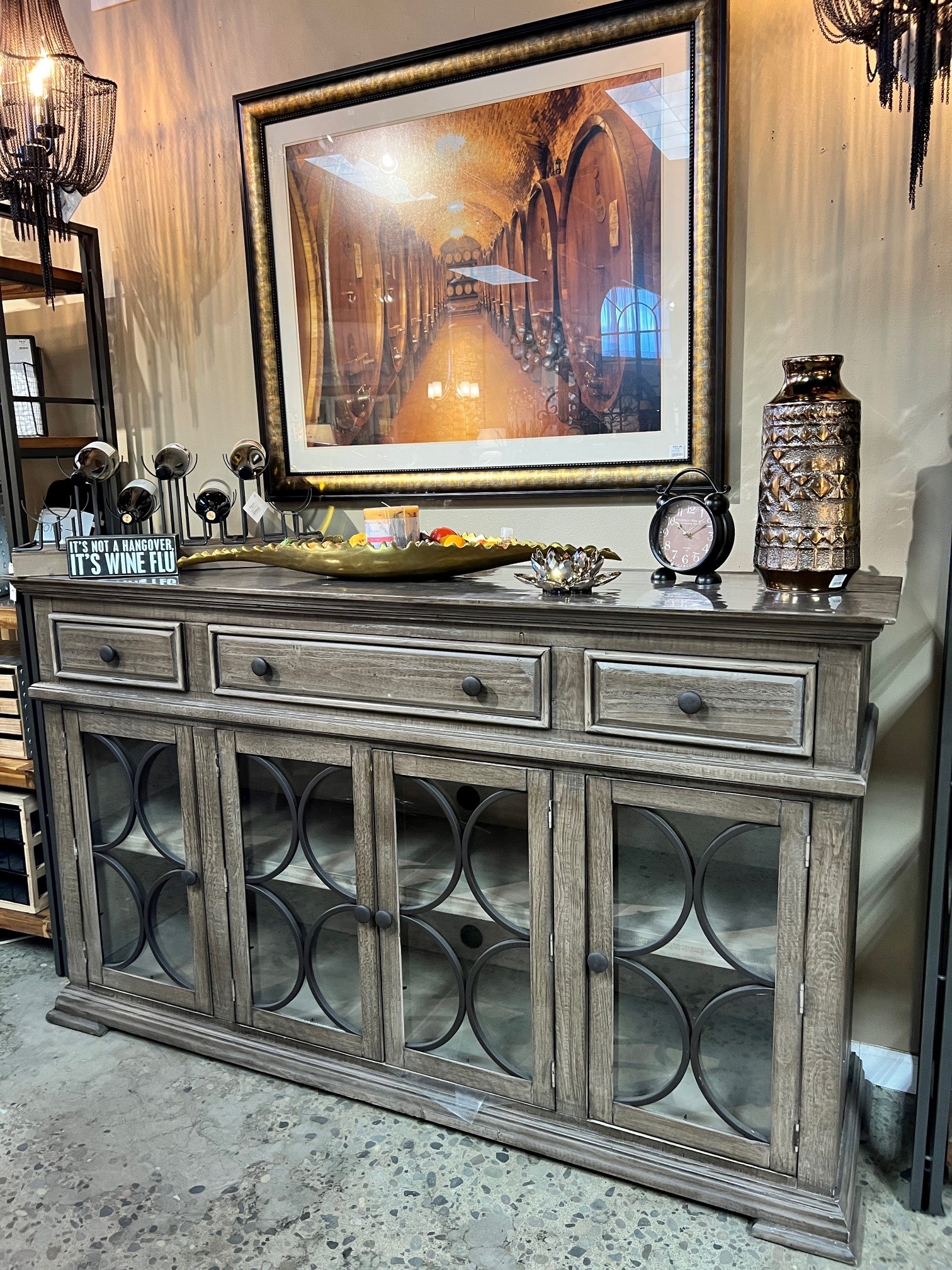 Wine cabinet with interior decor and winery painting